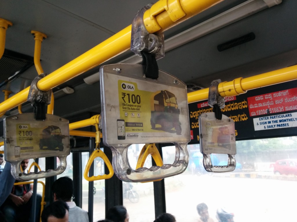 Ola bus grab handles ads