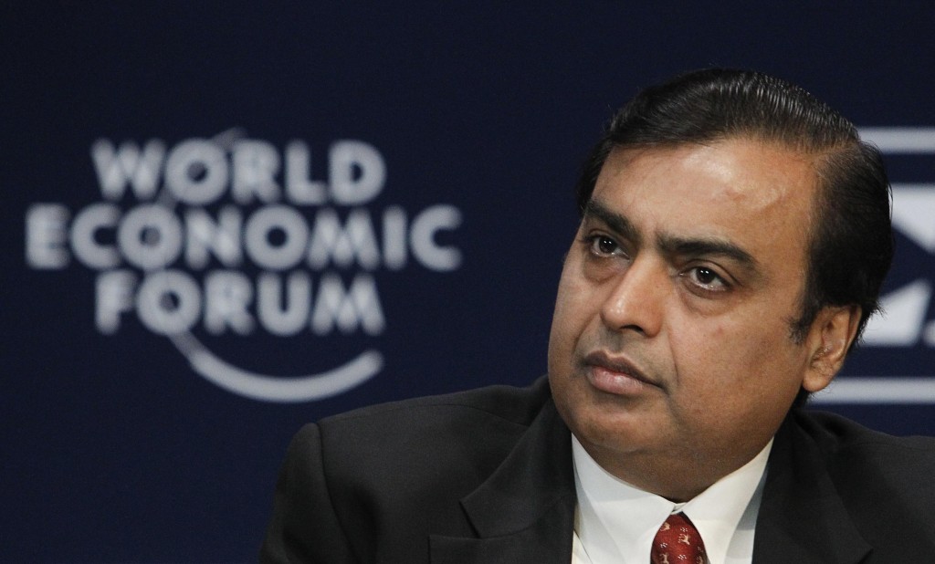 Chairman and Managing Director of Reliance Industries Mukesh Ambani attends the opening plenary session of the World Economic Forum (WEF) India Economic Summit in Mumbai November 13, 2011. REUTERS/Vivek Prakash (INDIA - Tags: BUSINESS)